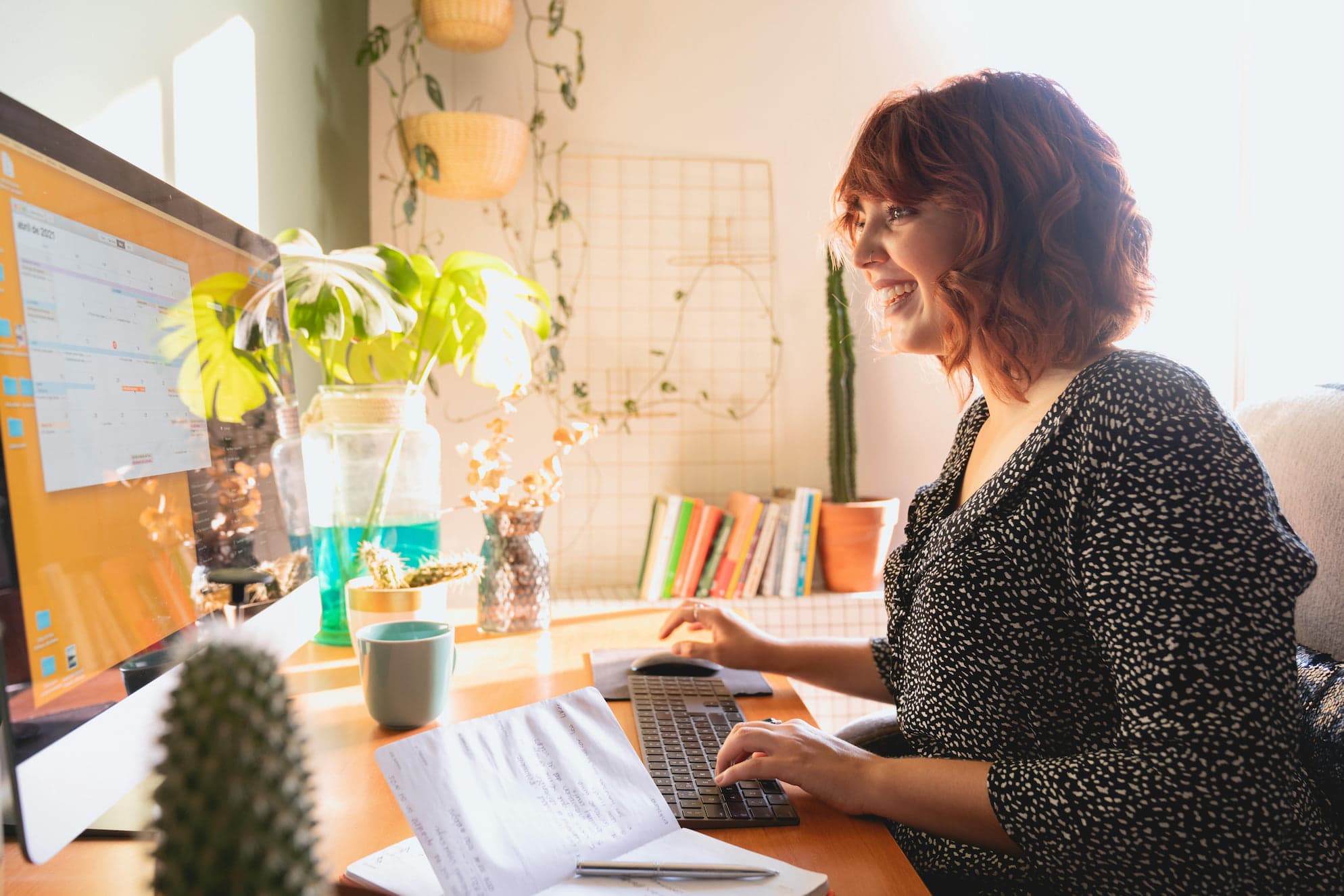 A Blip clinician working in a warm, bright home office