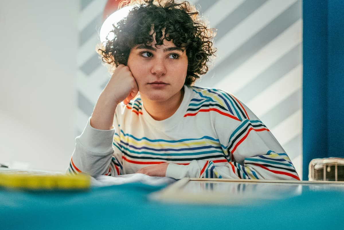 A young person in a calm, well-lit space